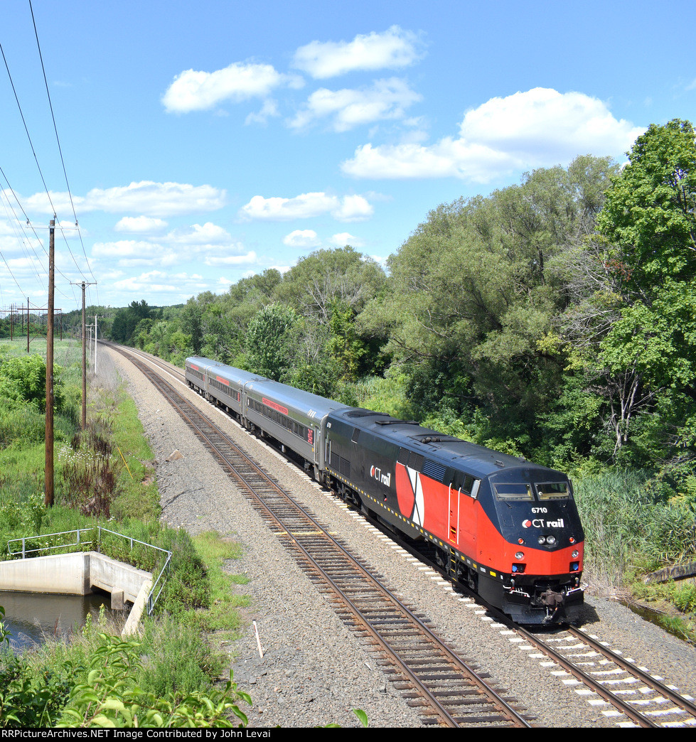 Ctrail Train # 6456, being pushed by P40BH # 6710, heads away toward its last stop of Hartford. Took this picture from the New Britain Ave bridge.